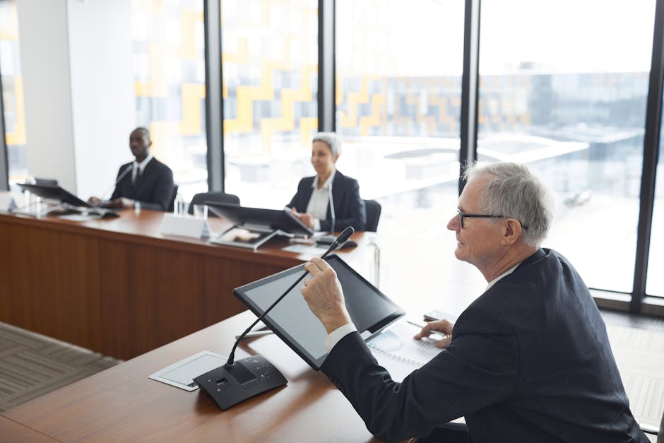 Business professionals engaged in a conference meeting, discussing strategy and cooperation