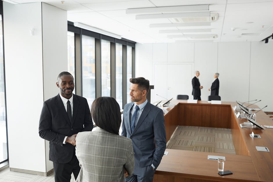 Business professionals engaging in a meeting in a modern conference room